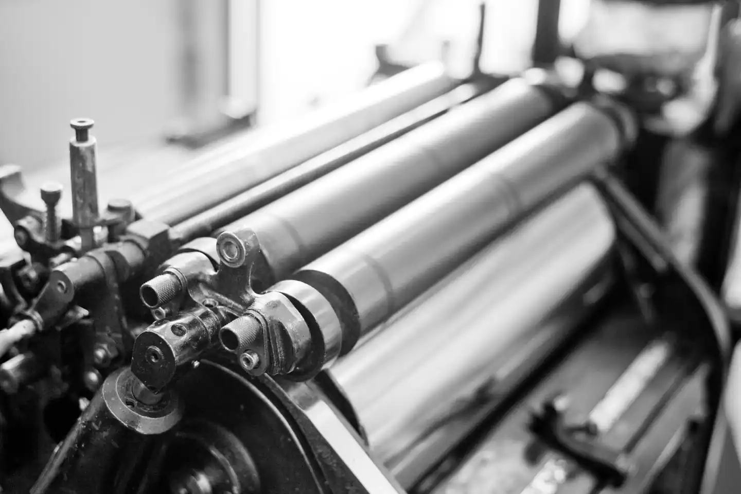 Close-up of printing press rollers